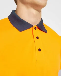 Roly HV9306 - POLARIS L/S Polo technique manches longue haute visibilité avec deux bandes refléchissantes sur manches